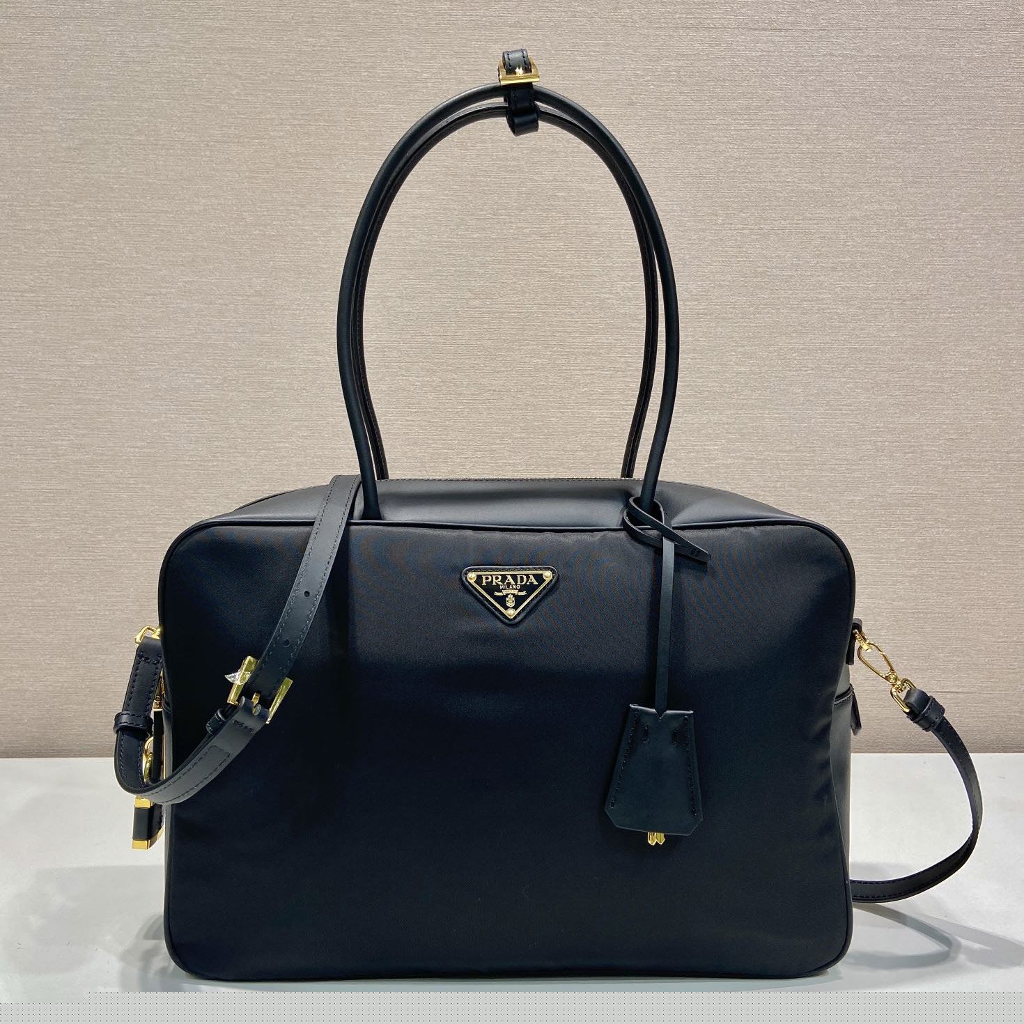 Pra*a top handle bags
